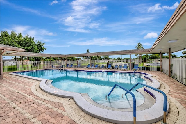 6820 NW 17th Ct, Margate, FL 33063 - community pool with a patio and fence
