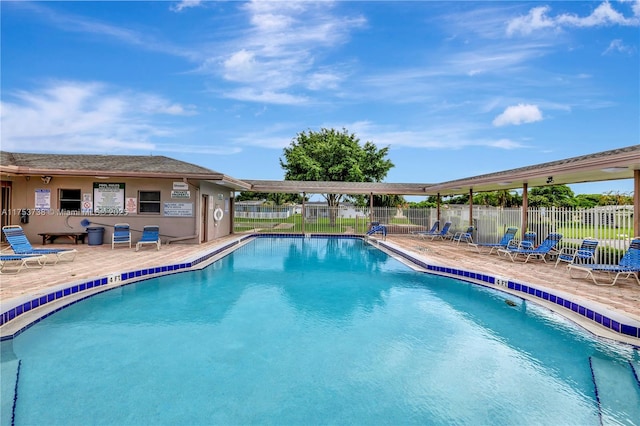 6820 NW 17th Ct, Margate, FL 33063 - community pool featuring a patio area and fence