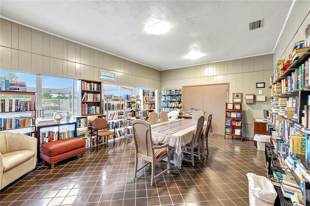 6820 NW 17th Ct, Margate, FL 33063 - dining room featuring dark tile patterned floors and visible vents
