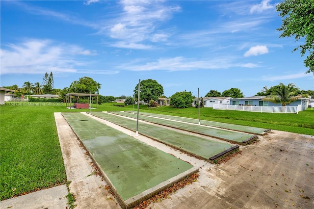 6820 NW 17th Ct, Margate, FL 33063 - view of home's community with a lawn and shuffleboard