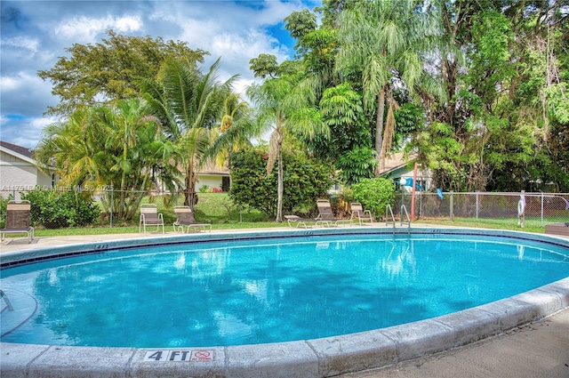 community pool with fence