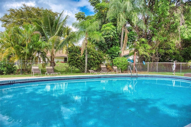 community pool with fence