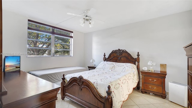 bedroom with light tile patterned floors