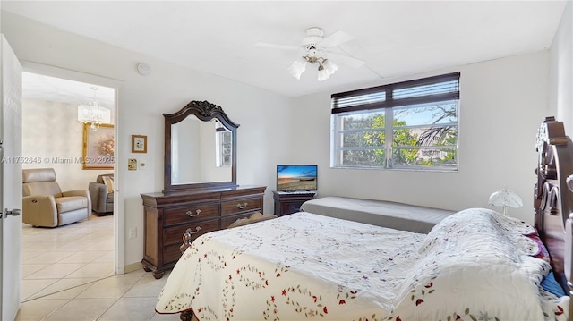 bedroom with light tile patterned floors