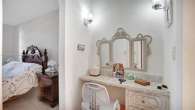 ensuite bathroom featuring ensuite bathroom and tile patterned floors