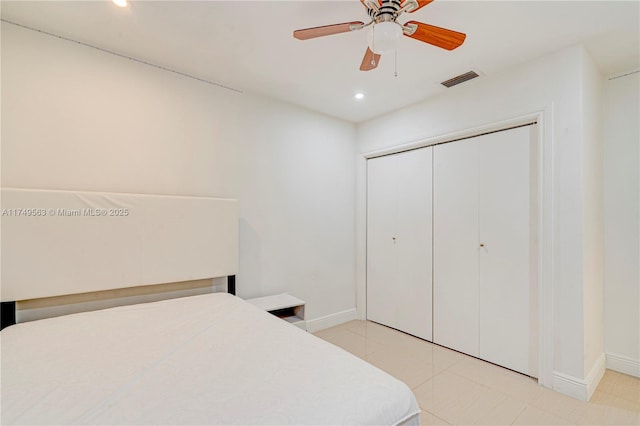 bedroom featuring recessed lighting, a closet, visible vents, and baseboards