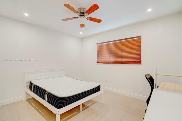 bedroom featuring recessed lighting, light tile patterned flooring, and baseboards