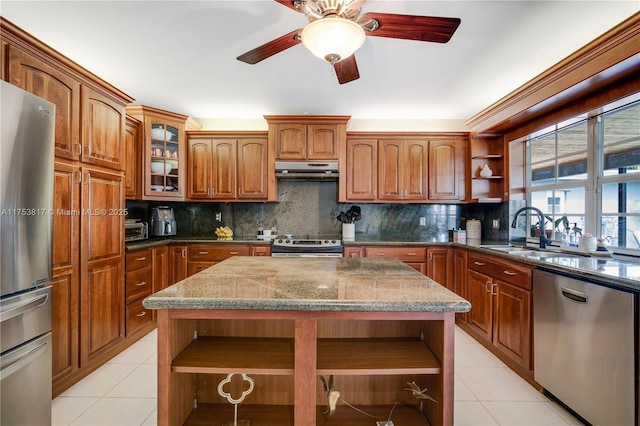 kitchen with stainless steel appliances, light tile patterned floors, under cabinet range hood, and open shelves