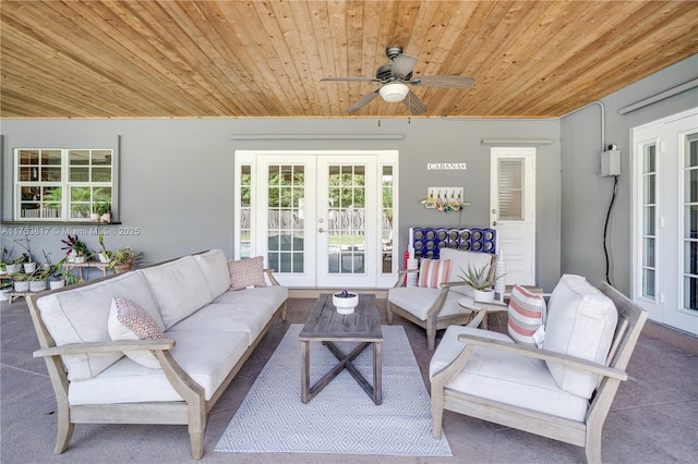 interior space with ceiling fan, french doors, and outdoor lounge area