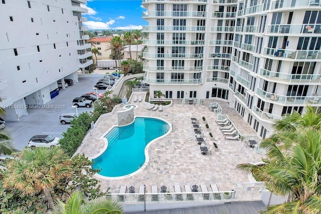 community pool with a patio