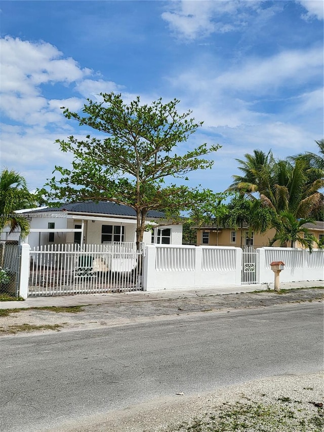 view of property hidden behind natural elements