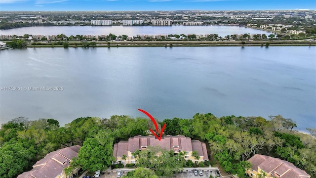 birds eye view of property featuring a water view