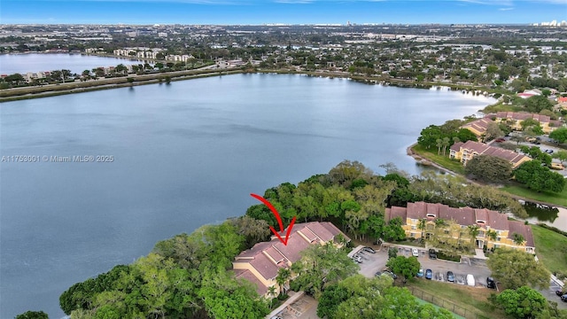 birds eye view of property featuring a water view