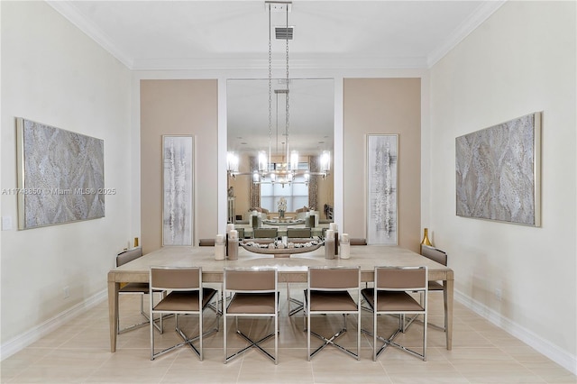dining room with baseboards, visible vents, a chandelier, and crown molding
