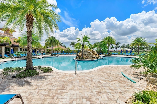 community pool featuring a patio area