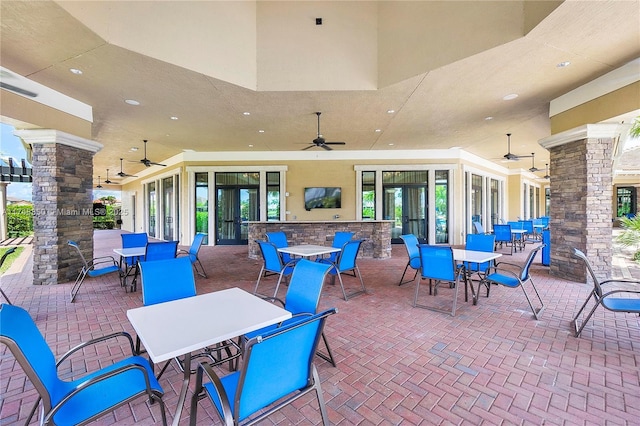 view of patio featuring ceiling fan and outdoor dining area