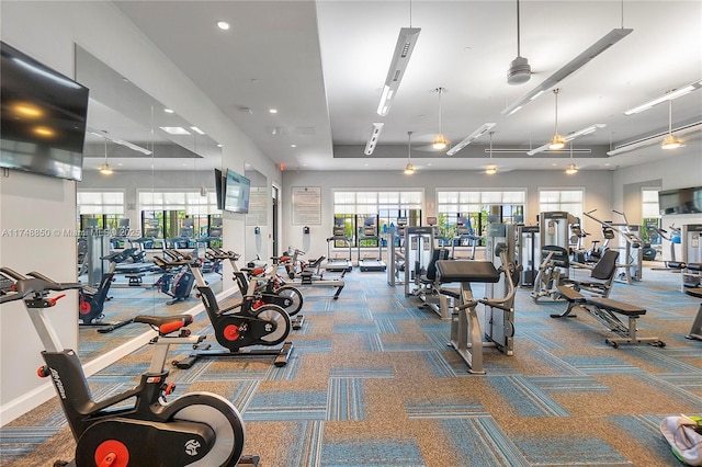 exercise room with baseboards