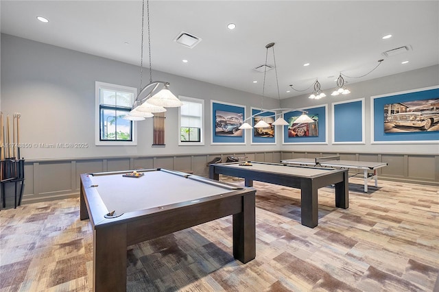 rec room with pool table, visible vents, and a decorative wall