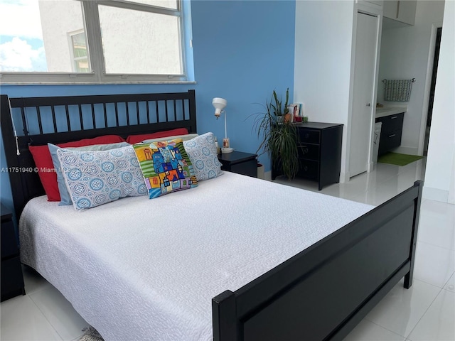 bedroom featuring tile patterned floors