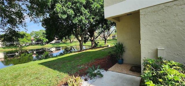 view of yard with a water view