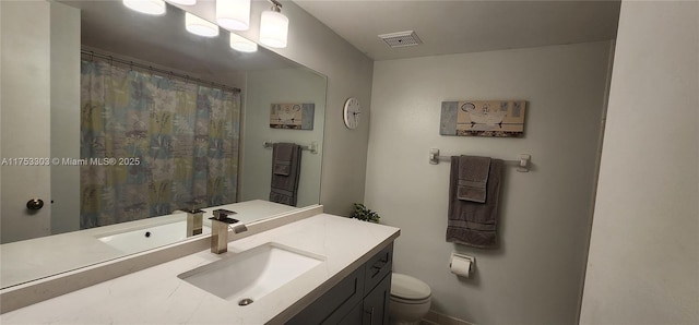 111 Gardens Dr Unit 203, Pompano Beach, FL 33069 - bathroom featuring vanity and toilet