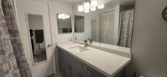 111 Gardens Dr Unit 203, Pompano Beach, FL 33069 - full bath featuring vanity, a chandelier, and a closet