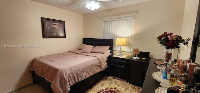 111 Gardens Dr Unit 203, Pompano Beach, FL 33069 - bedroom featuring a textured ceiling and a ceiling fan