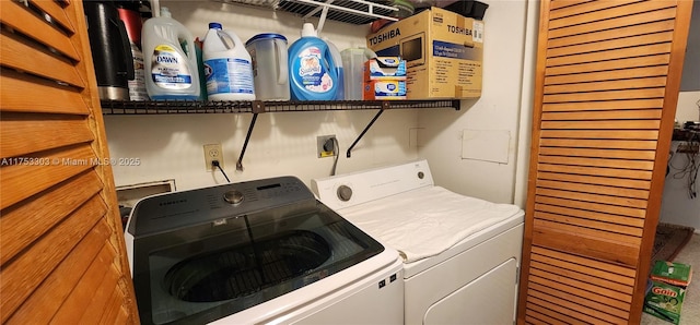 laundry room with washing machine and dryer and laundry area