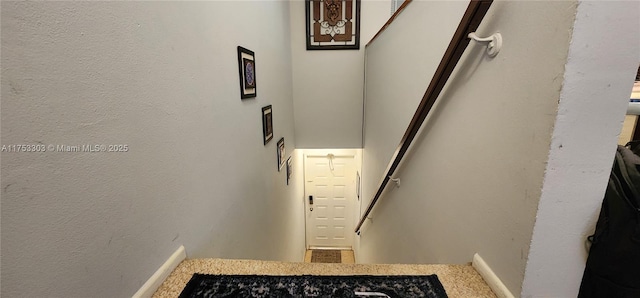 111 Gardens Dr Unit 203, Pompano Beach, FL 33069 - staircase featuring baseboards