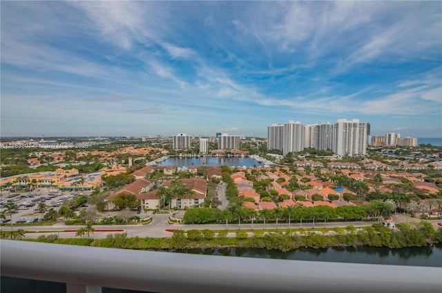 aerial view featuring a city view and a water view