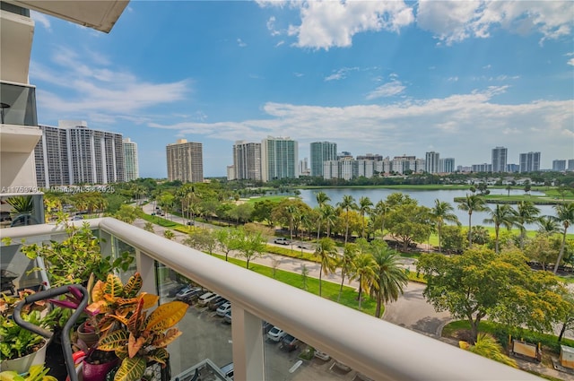 balcony with a city view and a water view