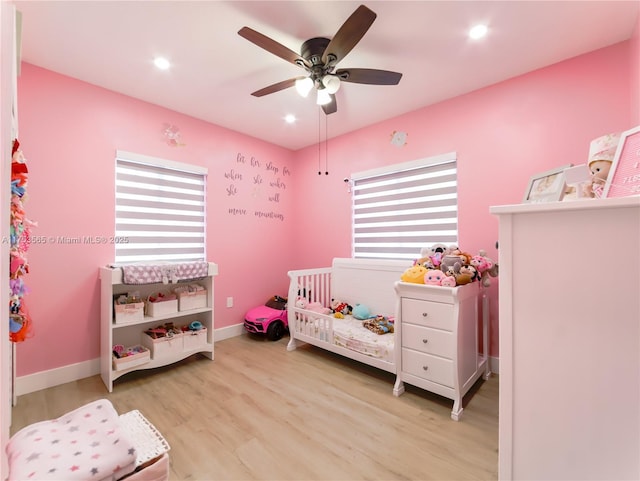 14779 SW 142nd St, Miami, FL 33196 - bedroom with wood finished floors, a nursery area, recessed lighting, and a ceiling fan