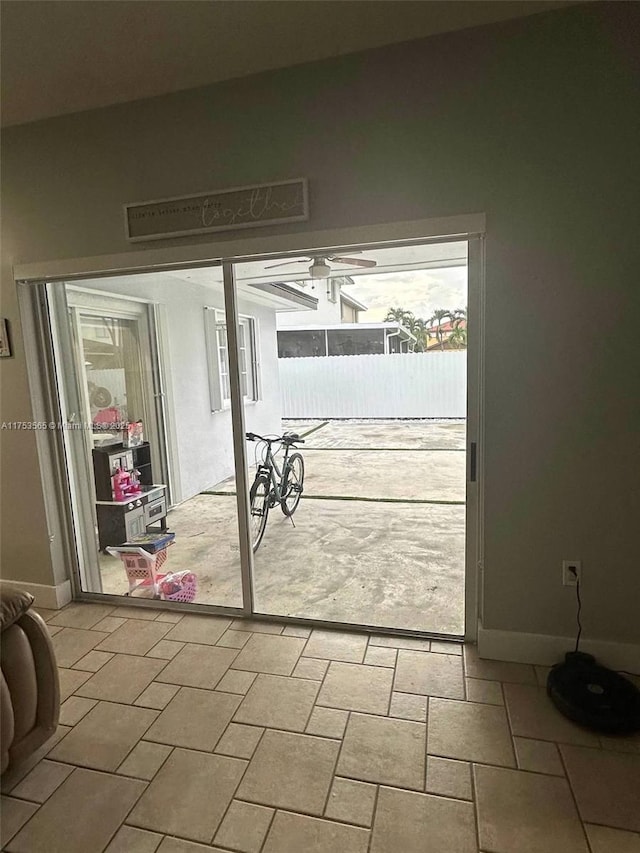 interior space featuring baseboards