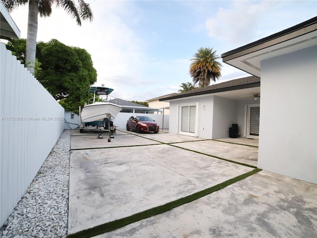 14779 SW 142nd St, Miami, FL 33196 - view of yard featuring a ceiling fan and concrete driveway