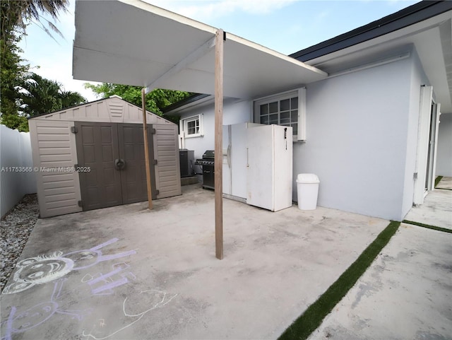 14779 SW 142nd St, Miami, FL 33196 - view of patio with a shed