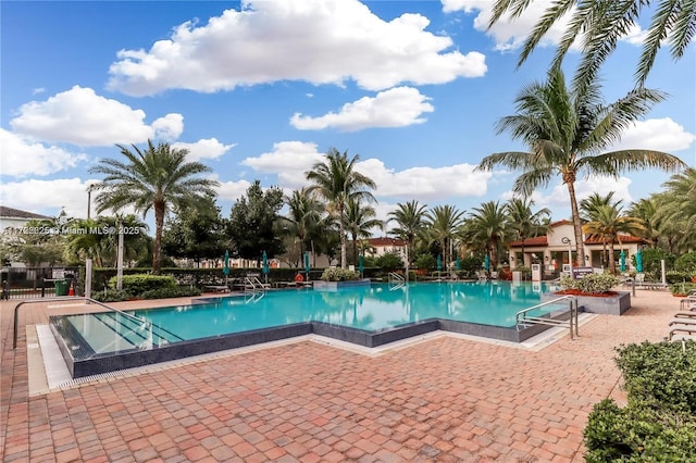 15340 SW 176th Ln, Miami, FL 33187 - community pool featuring a patio