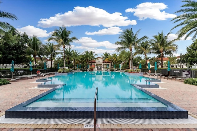 15340 SW 176th Ln, Miami, FL 33187 - community pool with a patio area