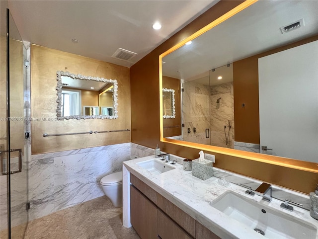 full bathroom featuring a sink, visible vents, and a shower stall