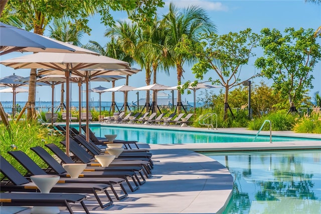 community pool featuring a patio area