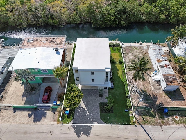 aerial overview of property's location featuring a large body of water and property parcel outlined