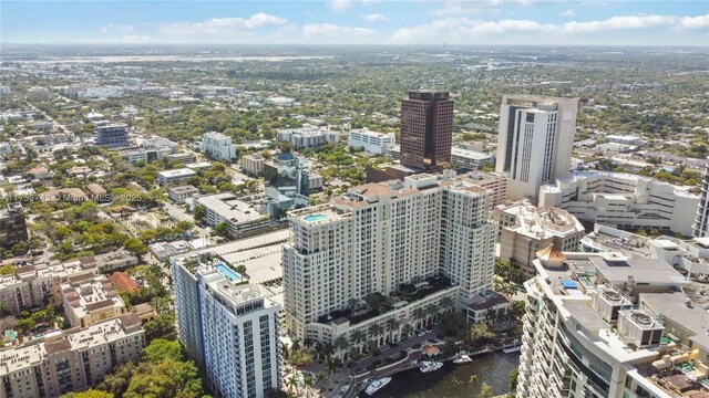 bird's eye view featuring a water view and a view of city