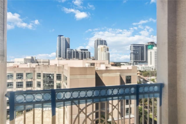 balcony featuring a city view