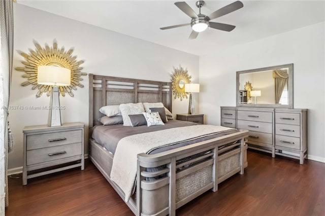 bedroom with ceiling fan and dark wood finished floors