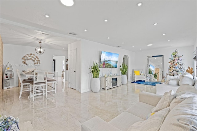 living room featuring baseboards, visible vents, marble finish floor, an inviting chandelier, and recessed lighting