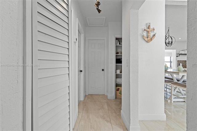 hallway with a textured wall