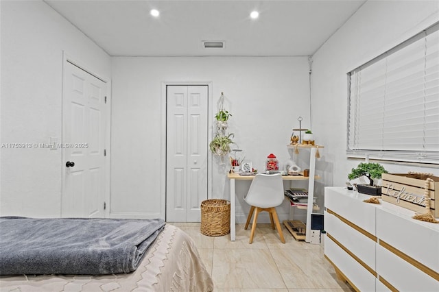 bedroom with visible vents and recessed lighting