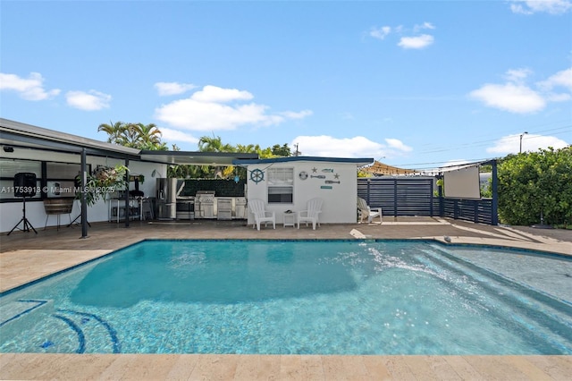 view of pool with a patio area and a fenced in pool