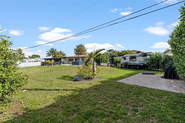 view of yard with a patio area and fence