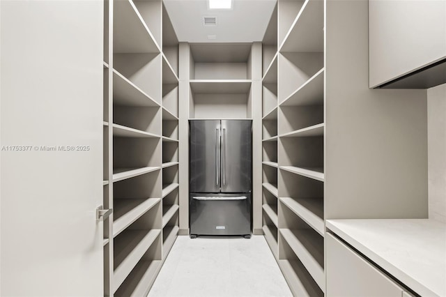 spacious closet with visible vents