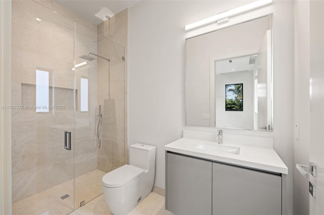 full bathroom featuring a stall shower, vanity, and toilet